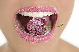 5594436-cherry-with-sugar-lips-between-woman-perfect-teeth-macro-mouth
